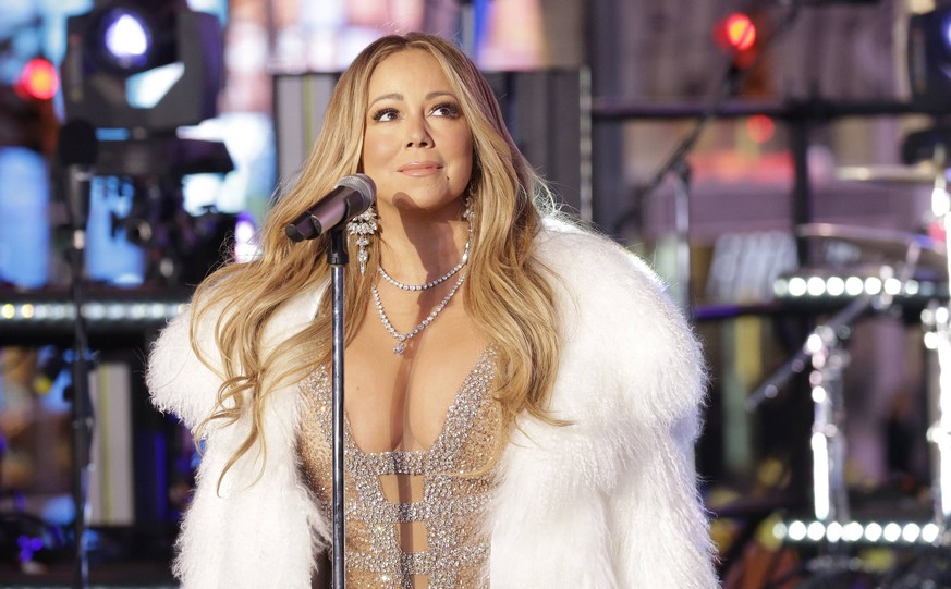 Mariah Carey performs in Times Square on New Year s Eve in New York City on December 31, 2017. An estimated one million people will be in Times Square on New Year s Eve and over one billion will be wa ...
