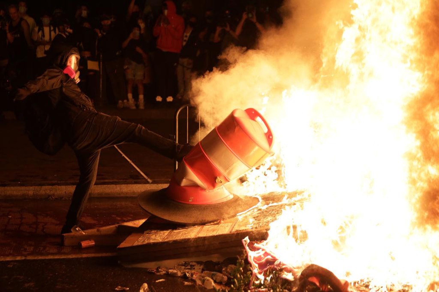 WASHINGTON, DC - MAY 31: Demonstrators set a fire during a protest near the White House on May 31, 2020 in Washington, DC. Minneapolis police officer Derek Chauvin was arrested for Floyd&#039;s death  ...