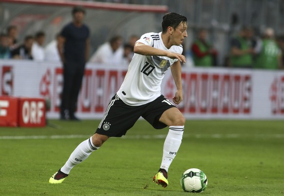 Germany&#039;s Mesut Ozil runs with the ball during a friendly soccer match between Austria and Germany in Klagenfurt, Austria, Saturday, June 2, 2018. (AP Photo/Ronald Zak)