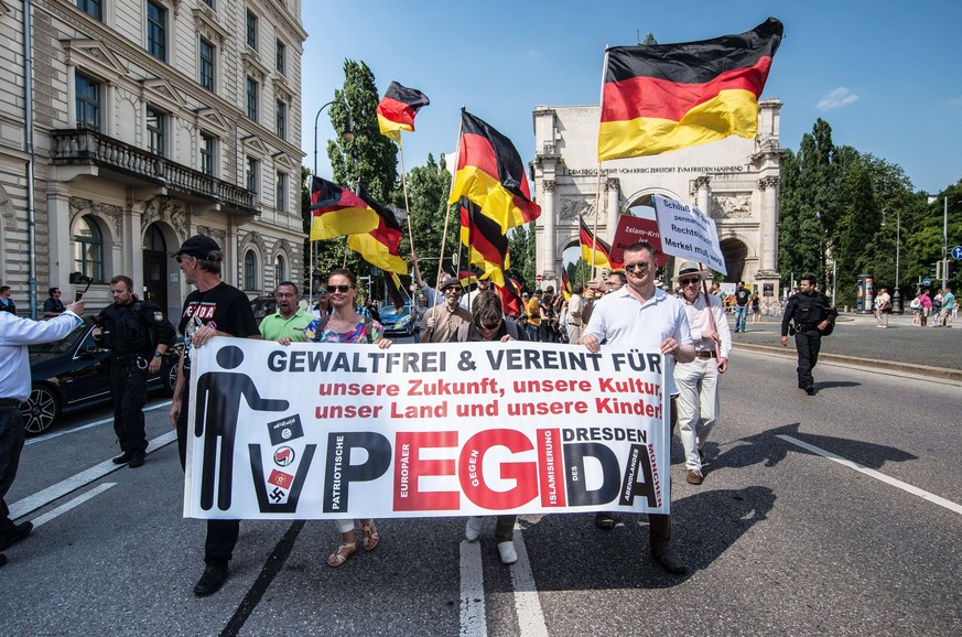 June 30, 2018 - Munich, Bavaria, Germany - Pegida Dresden, one of two Pegida factions fighting for Munich, took to the streets on Saturday afternoon to call for Chancellor Merkel to step down. The cha ...