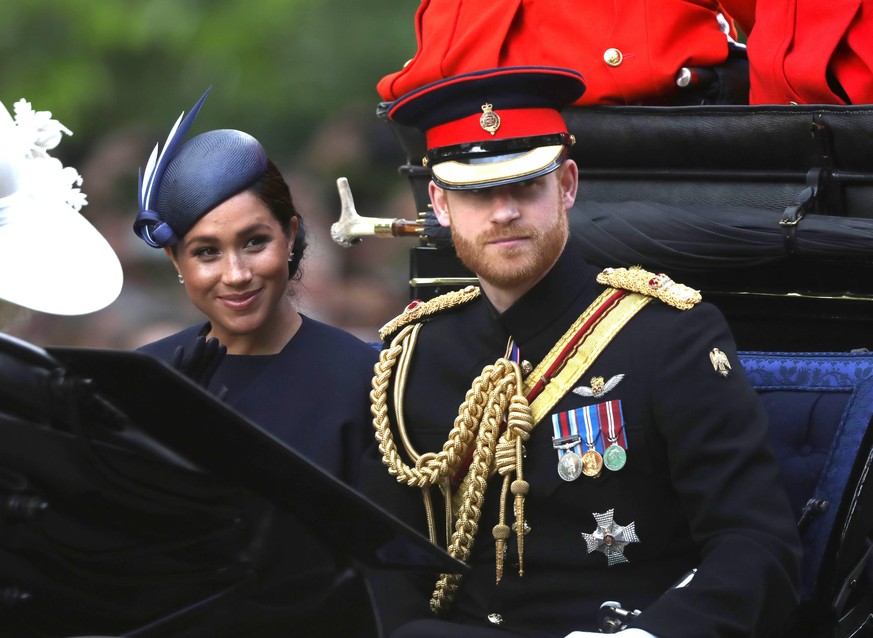 Meghan Markle Duchess of Sussex, Prince Harry Duke of Sussex, in a carriage on their way to Horse Guards Parade at the Trooping of the Colour 2019. Trooping the Colour marks the Queens official birthd ...