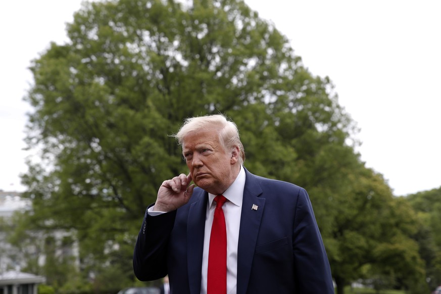 President Donald Trump speaks with reporters on the South Lawn of the White House as he departs on Marine One, Thursday, May 14, 2020, in Washington. Trump is en route to Allentown, Pa. (AP Photo/Alex ...