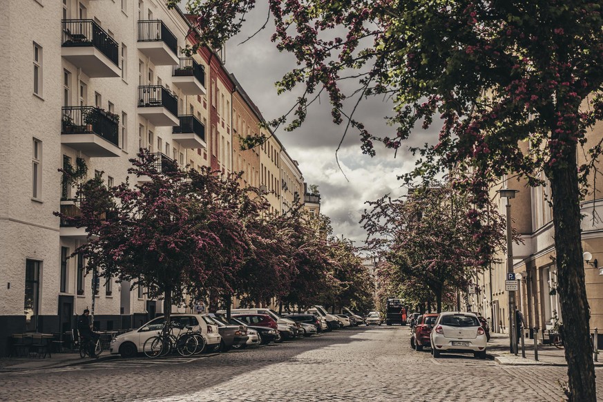 14 May 2019, berlin, Germany - residential district in Berlin. Blooming trees in morning