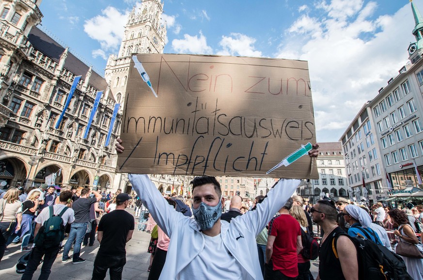 May 9, 2020, Munich, Bavaria, Germany: Protest against an immunity passport, as well as compulsory vaccination. Despite ongoing relaxing measures, a â€œQuerfrontâ€ (cross-front) mixture of 3,000 cons ...