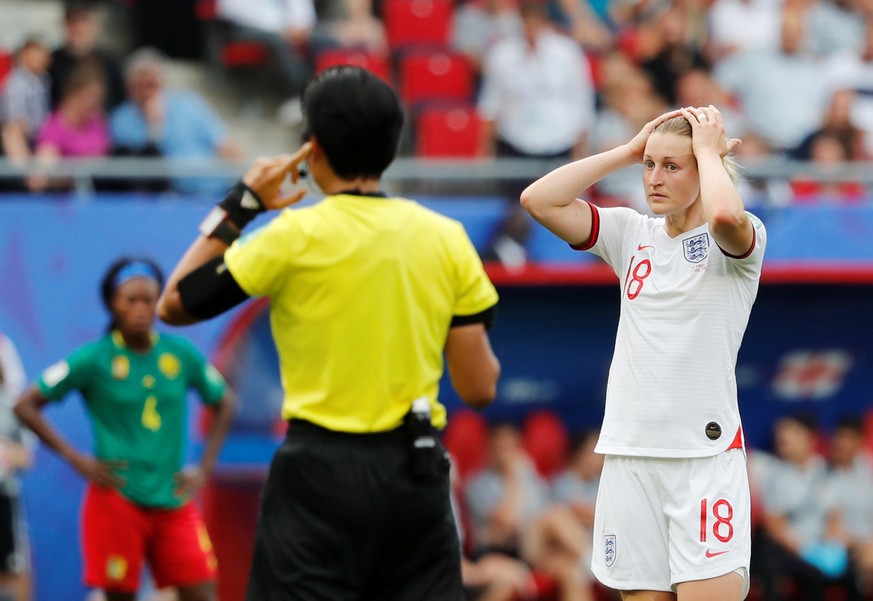Soccer Football - Women&#039;s World Cup - Round of 16 - England v Cameroon - Stade du Hainaut, Valenciennes, France - June 23, 2019 England&#039;s Ellen White reacts during a VAR review REUTERS/Berna ...