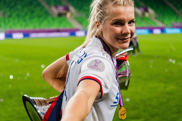 190518 Ada Hegerberg of Lyon with her gold medal and the trophy after the UEFA Women s Champions League final match between Lyon and Barcelona on May 18, 2019 in Budapest. Photo: Jon Olav Nesvold / BI ...