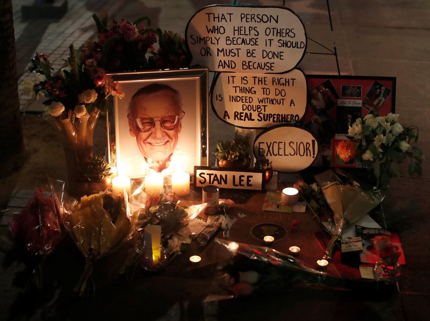 Flowers and mementos are pictured on the star of late Marvel Comics co-creator Stan Lee on the Hollywood Walk of Fame in Los Angeles, California, U.S., November 12, 2018. REUTERS/Mario Anzuoni NO RESA ...