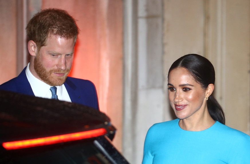 Britain&#039;s Prince Harry and his wife Meghan, Duchess of Sussex, leave after attending the Endeavour Fund Awards in London, Britain March 5, 2020. REUTERS/Hannah McKay
