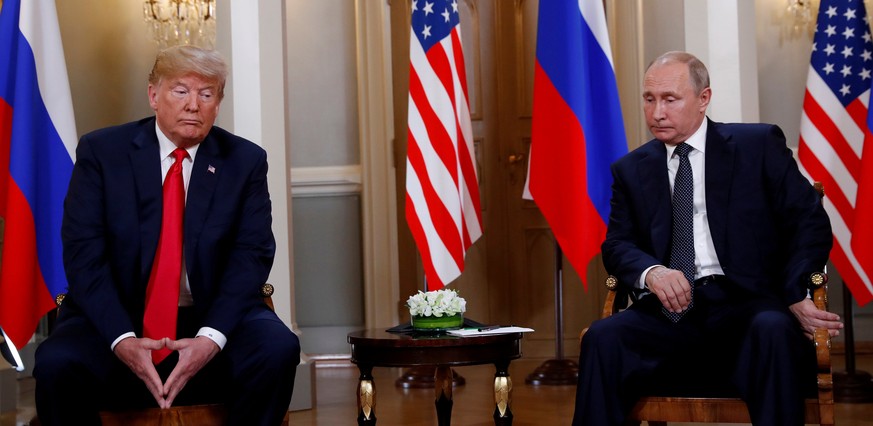 U.S. President Donald Trump meets with Russian President Vladimir Putin in Helsinki, Finland, July 16, 2018. Reuters photographer Kevin Lamarque: &quot;Body language can give an ordinary photo much mo ...