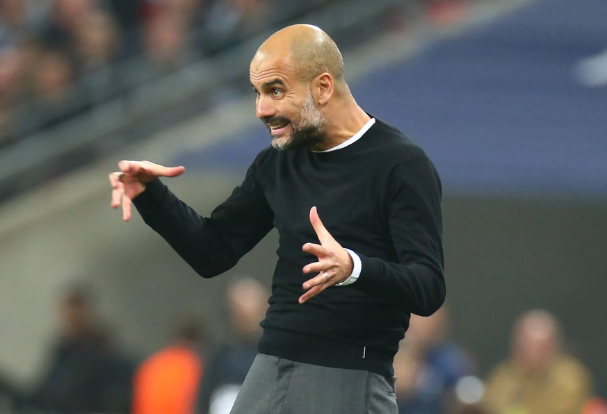 April 14, 2018 - London, England, United Kingdom - Manchester City manager Pep Guardiola .during the Premiership League match between Tottenham Hotspur and Manchester City at Wembley, London, England  ...