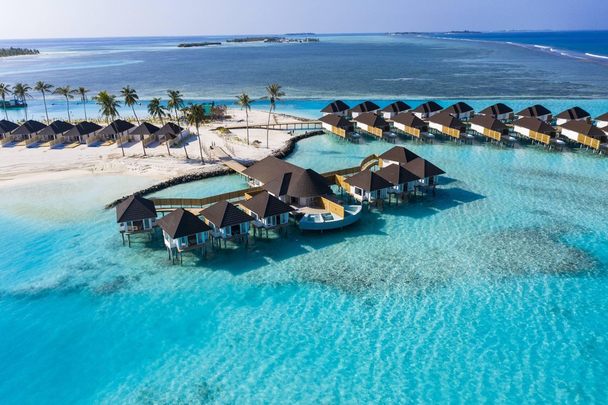 Aerial view of water bungalows, South Male Atoll, Maledives PUBLICATIONxINxGERxSUIxAUTxHUNxONLY AMF07103