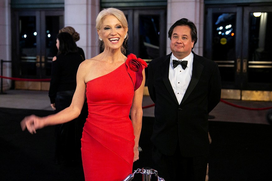 FILE PHOTO: White House Counselor Kellyanne Conway and her husband George Conway arrive for a candlelight dinner at Union Station on the eve of the 58th Presidential Inauguration in Washington, U.S.,  ...