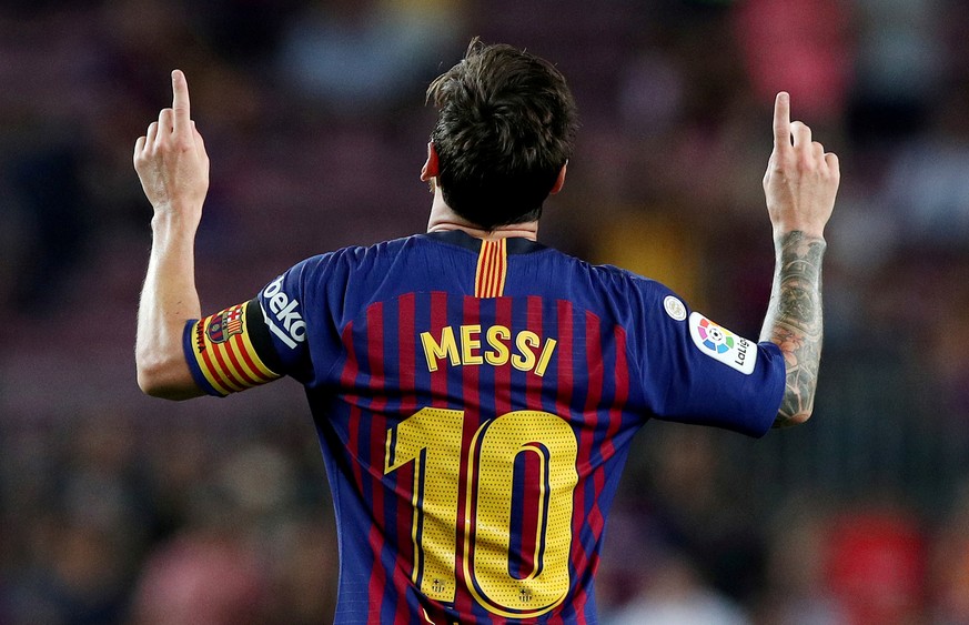 FILE PHOTO: Soccer Football - La Liga Santander - FC Barcelona v Alaves - Camp Nou, Barcelona, Spain - August 18, 2018 Barcelona&#039;s Lionel Messi celebrates scoring their third goal REUTERS/Albert  ...