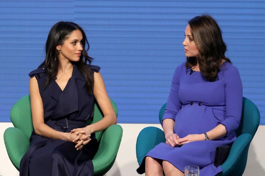 LONDON, ENGLAND - FEBRUARY 28: (L-R) Meghan Markle and Catherine, Duchess of Cambridge attend the first annual Royal Foundation Forum held at Aviva on February 28, 2018 in London, England. Under the t ...