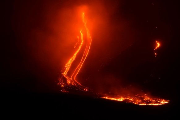Mount Etna volcano spews lava during an eruption early Tuesday Dec. 25, 2018. Italy&#039;s Catania airport is reopening after an ash cloud from Mount Etna&#039;s latest eruptions forced it to shut dow ...