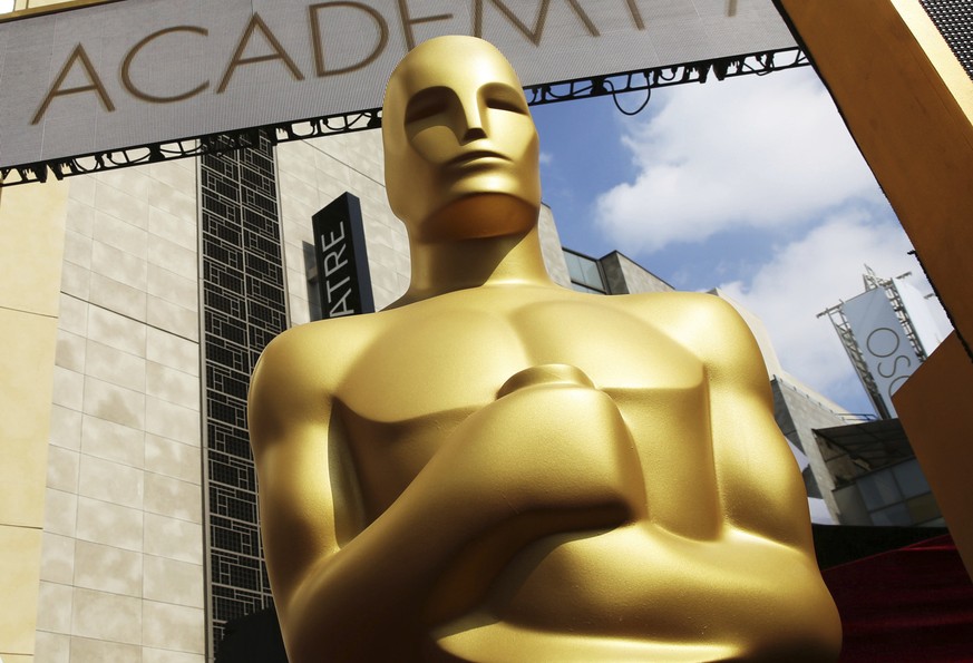 FILE - In this Feb. 21, 2015 file photo, an Oscar statue appears outside the Dolby Theatre for the 87th Academy Awards in Los Angeles. The organization that bestows the Academy Awards says it is suspe ...