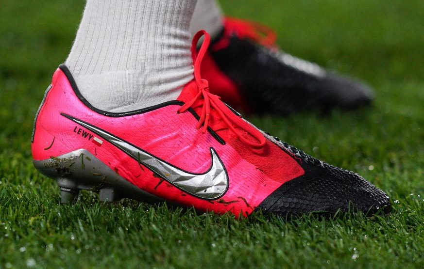 The football boot of Robert Lewandowski of Bayern Munich displaying LEWY &amp; Poland flag during the UEFA Champions League round of 16 1st leg match between Chelsea and Bayern Munich at Stamford Brid ...