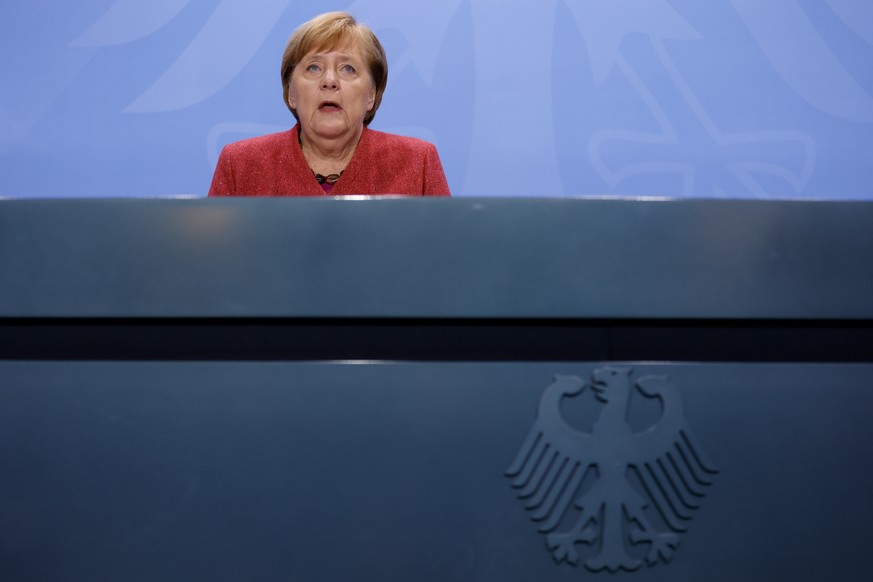 German Chancellor Angela Merkel addresses a news conference on the coronavirus disease (COVID-19), following video consultations with the premiers of Germany&#039;s 16 federal states, at Chancellery i ...