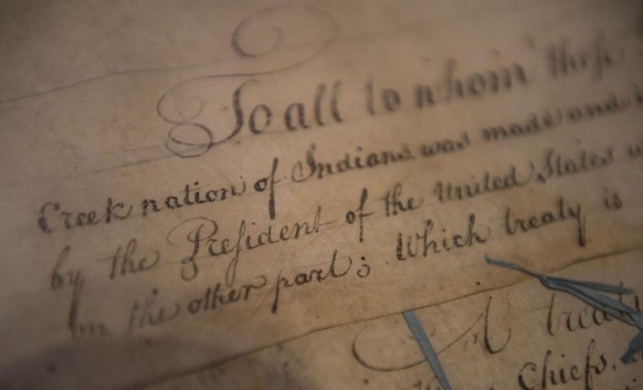 FILE - This March 16, 2015, file photo, shows a detail of the 1790 Treaty of the Muscogee (Creek) Nations and the United States non display at the Smithsonian&#039;s National Museum of the American In ...
