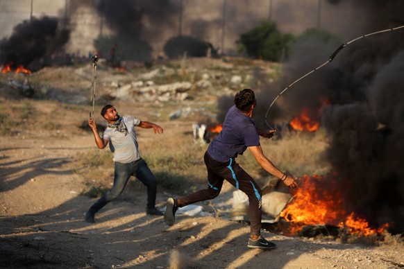 July 20, 2018 - Gaza, gaza strip, Palestine - Protesters gather at a demonstration along the border with Israel east of Gaza City on. Israeli aircraft and tanks hit targets across the Gaza Strip on Ju ...