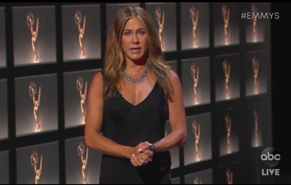 In this video grab captured on Sept. 20, 2020, courtesy of the Academy of Television Arts &amp; Sciences and ABC Entertainment, Jennifer Aniston presents the award for outstanding lead actress in a co ...