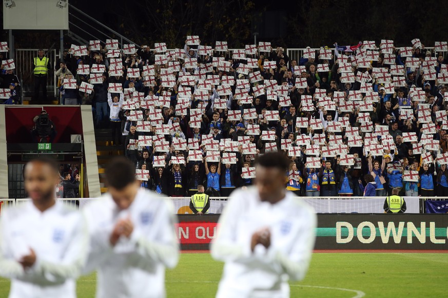 Kosovo v England UEFA EURO, EM, Europameisterschaft,Fussball 2020 Qualifiers The Kosovo fans hold up England flags during the National Anthem before the UEFA Euro 2020 Qualifiers match at Fadil Vokrri ...