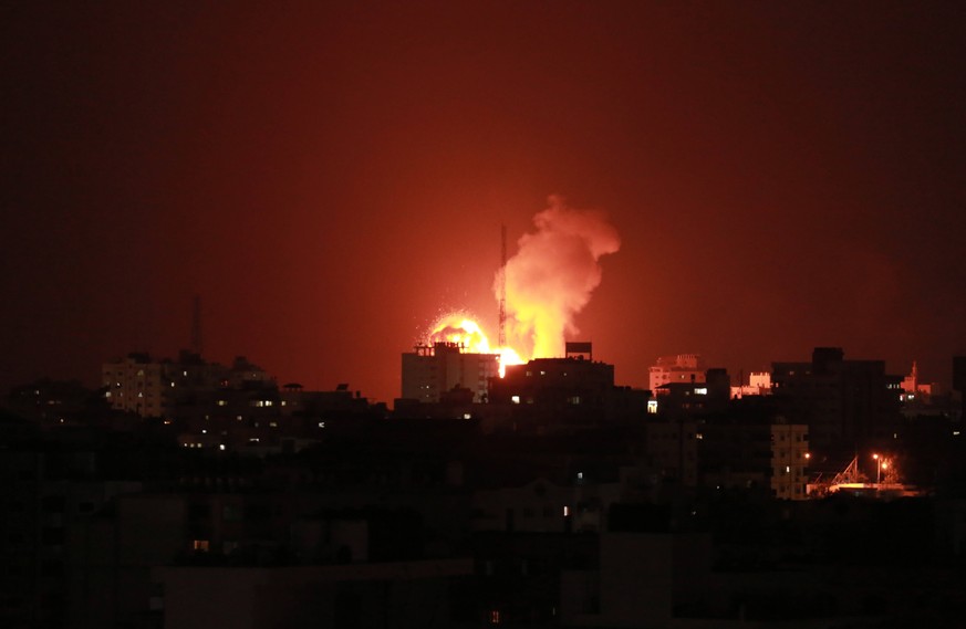 May 10, 2021, Gaza city, Gaza Strip, Palestinian Territory: Fire billow from Israeli air strikes in the Gaza Strip, on May 10, 2021. Israel launched deadly air strikes on Gaza in response to a barrage ...