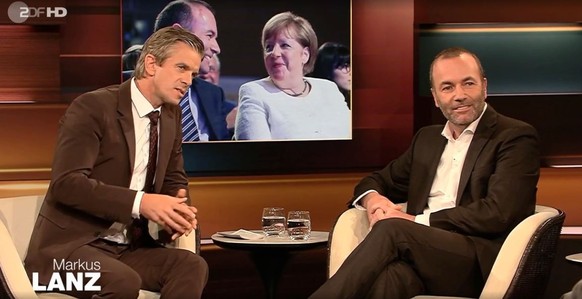 Zu Merkel habe Weber (r.) ein "vertrauensvolles Verhältnis".