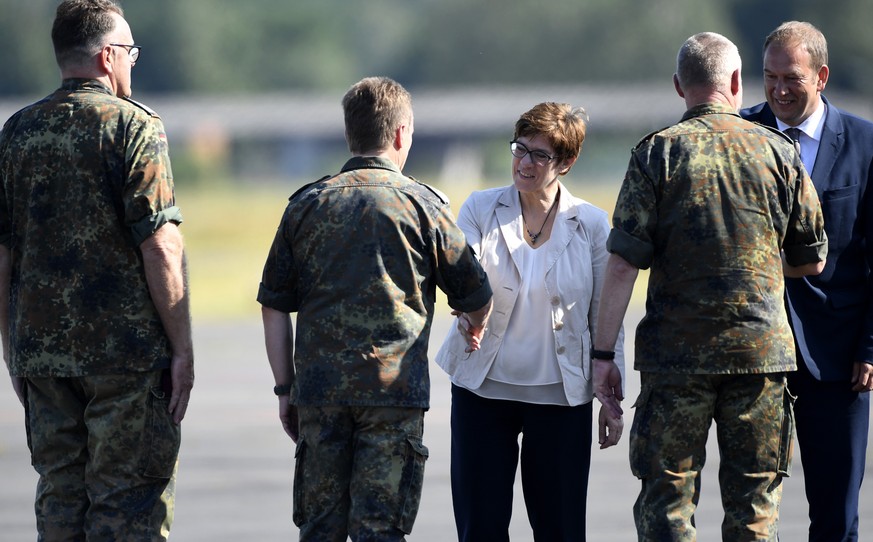 German Defence Minister Annegret Kramp-Karrenbauer welcomes soldiers as she visits troops of the German army Bundeswehr in Celle, Germany July 24, 2019. REUTERS/Fabian Bimmer