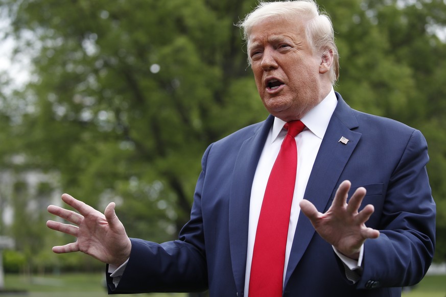 President Donald Trump speaks with reporters on the South Lawn of the White House as he departs on Marine One, Thursday, May 14, 2020, in Washington. Trump is en route to Allentown, Pa. (AP Photo/Alex ...