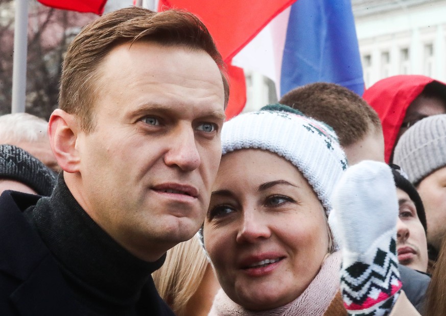 MOSCOW, RUSSIA - FEBRUARY 29, 2020: Opposition activist Alexei Navalny with wife Yulia take part in a memorial march marking the 5th anniversary of the assassination of opposition activist Boris Nemts ...