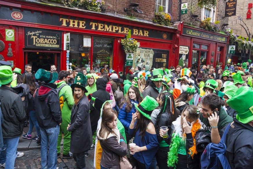 Dublin, Ireland - March 17, 2014: Saint Patrick&#039;s Day parade in Dublin Ireland on March 17, 2014: People dress up Saint Patrick&#039;s at The Temple Bar