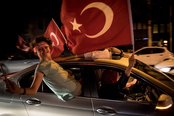 ISTANBUL, TURKEY - JUNE 24: Supporters of Turkey&#039;s President Recep Tayyip Erdogan celebrate in their cars on June 24, 2018 in Istanbul, Turkey. Preliminary results point to a victory for Presiden ...