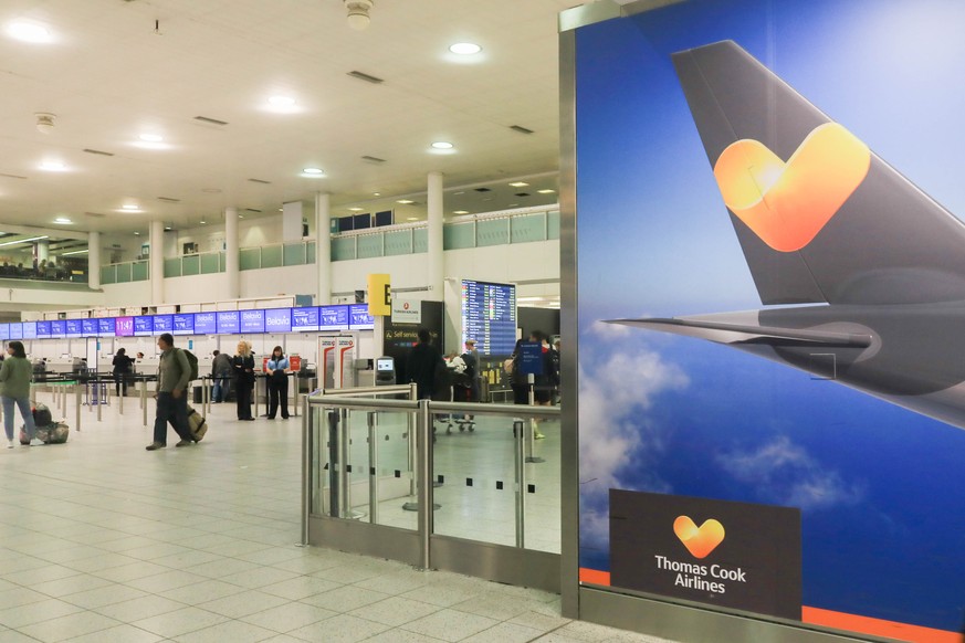 September 22, 2019, Gatwick Airport, United Kingdom: A large poster of Thomas Cook airlines at the South terminal of Gatwick Airport as the tour operator faces financial difficulties with 150,000 pass ...