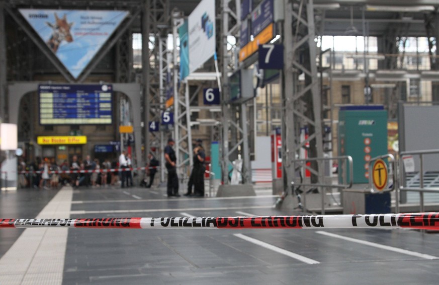 (190729) -- FRANKFURT, July 29, 2019 -- Local police block part of the Frankfurt main station in Frankfurt, Germany, July 29, 2019. An 8-year-old boy was killed by a moving train after he and his moth ...