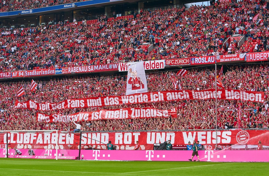 FC Bayern Munich Soccer, Munich, September 15, 2018 fans, supporters, spectators, club flags, celebration, fan, wave, colors, sea of flags, soccerfan, clothes, drawings, masquerade, football, jacket,  ...