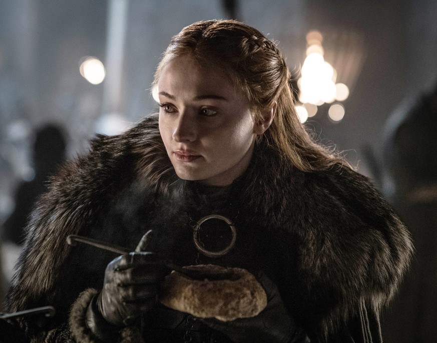This image released by HBO shows Sophie Turner in a scene from &quot;Game of Thrones,&quot; that aired Sunday, April 21, 2019. With the Game of Thrones&#039; Jon Snow revealing his royal lineage to hi ...