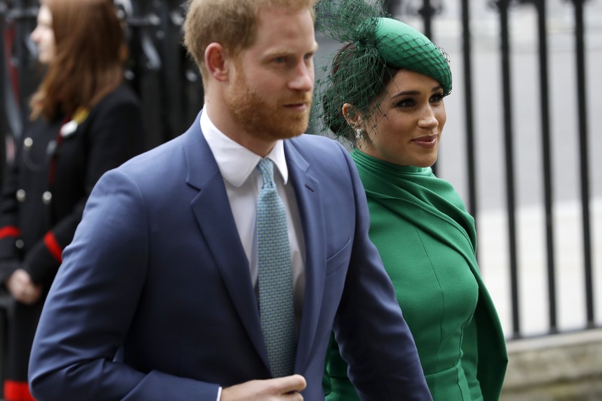 FILE - In this March 9, 2020, file photo, Britain&#039;s Harry and Meghan the Duke and Duchess of Sussex arrive to attend the annual Commonwealth Day service at Westminster Abbey in London. Almost as  ...