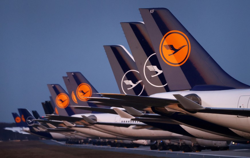 FILE PHOTO: Planes of German carrier Lufthansa are parked on a closed runway at the airport in Frankfurt, Germany, March 23, 2020, as the spread of the coronavirus disease (COVID-19) continues. REUTER ...