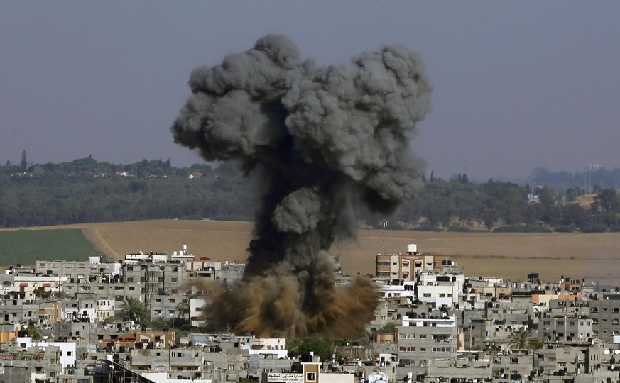 Smoke rises after an Israeli airstrike in Gaza City, Tuesday, May 11, 2021. (AP Photo/Hatem Moussa)