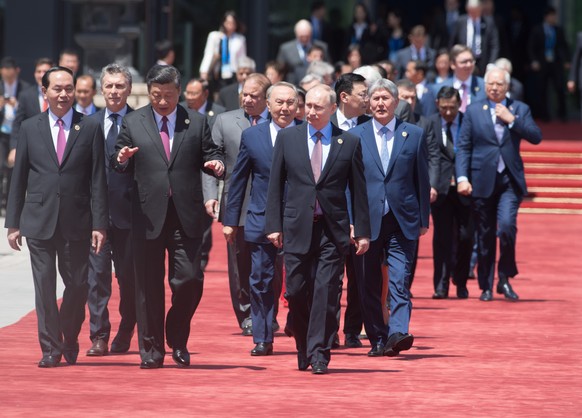 3098945 05/15/2017 May 15, 2017. Russian President Vladimir Putin during a group photo session for the participants in a roundtable summit held as part of the Belt and Road Forum, in front of the Yanq ...