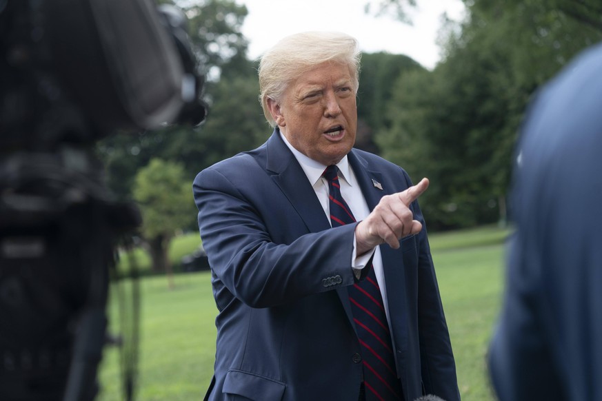 July 27, 2020, Washington, District of Columbia, USA: United States President Donald J. Trump speaks to the media before departing the White House in Washington, DC to visit the Bioprocess Innovation  ...