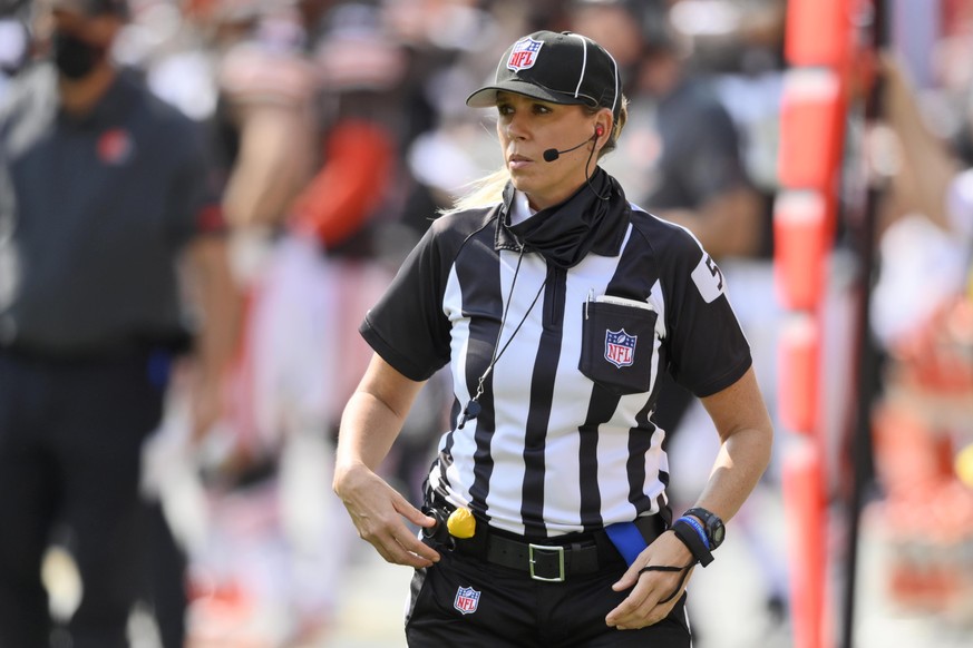 Down judge Sarah Thomas keeps watch during the second half of an NFL football game between the Cleveland Browns and the Washington Football Team, Sunday, Sept. 27, 2020, in Cleveland. (AP Photo/David  ...