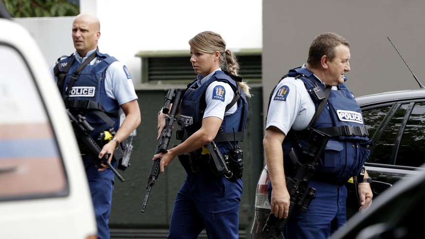 Armed police patrol outside a mosque in central Christchurch, New Zealand, Friday, March 15, 2019. A witness says many people have been killed in a mass shooting at a mosque in the New Zealand city of ...