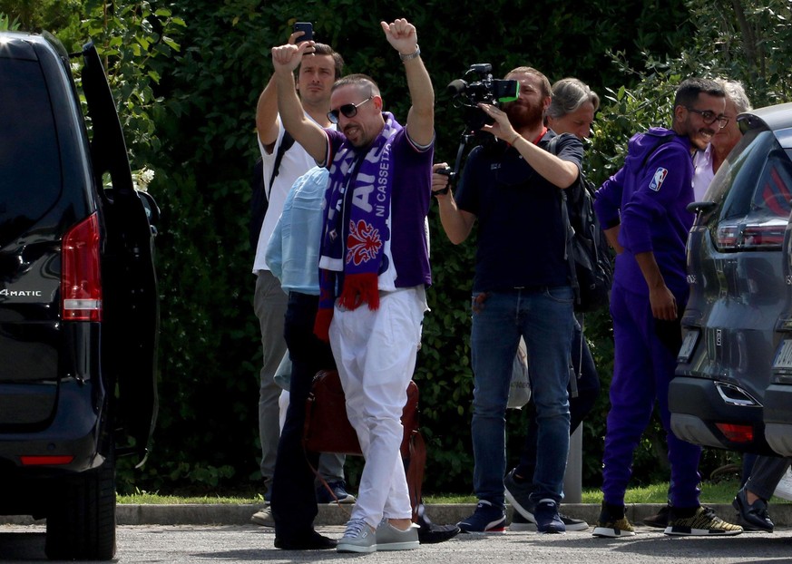 Franck Ribery waves to fans upon his arrival in Florence, Italy, Wednesday, Aug. 21, 2019. Franck Ribery has joined Italian club Fiorentina in another big signing for a team under new American ownersh ...