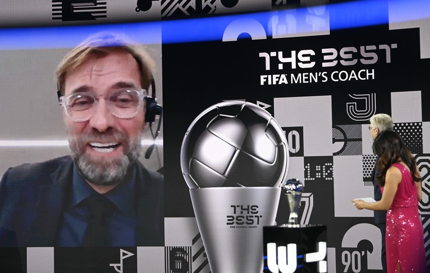 Liverpool&#039;s manager Jurgen Klopp smiles after being awarded as Men&#039;s coach of the year during the Best FIFA Football Awards Ceremony in Zurich, Switzerland, Thursday, Dec. 17, 2020. (Valeria ...