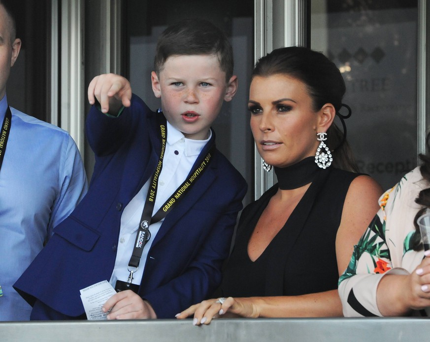 National Hunt Horse Racing - 2018 Randox Health Grand National Festival - Saturday, Day Three (Grand National Day) Kai Wayne Rooney watches the racing with his mum, Coleen Rooney in the 13.45 Gaskells ...