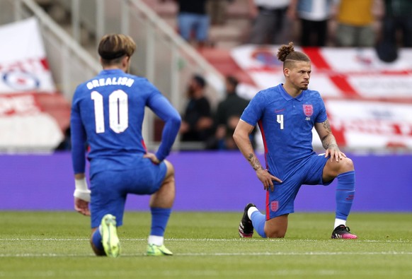 England file photo. File photo dated 06-06-2021 of England&#039;s Jack Grealish and Kalvin Phillips take a knee before the international friendly match at Riverside Stadium, Middlesbrough. Issue date: ...