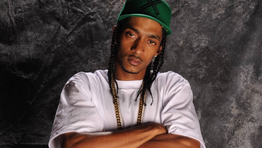 ***FILE PHOTO*** Rapper Nipsey Hussle killed in shooting outside his clothing store in Los Angeles. MIAMI, FL - JUNE 6: Nipsey Hussle poses for a portrait at DJ Khaled studio on June 9, 2009 in Miami  ...