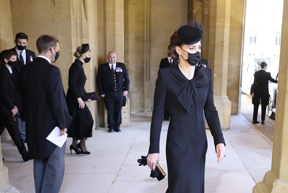 Kate, Duchess of Cambridge, center, arrives to attend the funeral of Britain&#039;s Prince Philip inside Windsor Castle in Windsor, England, Saturday, April 17, 2021. Prince Philip died April 9 at the ...